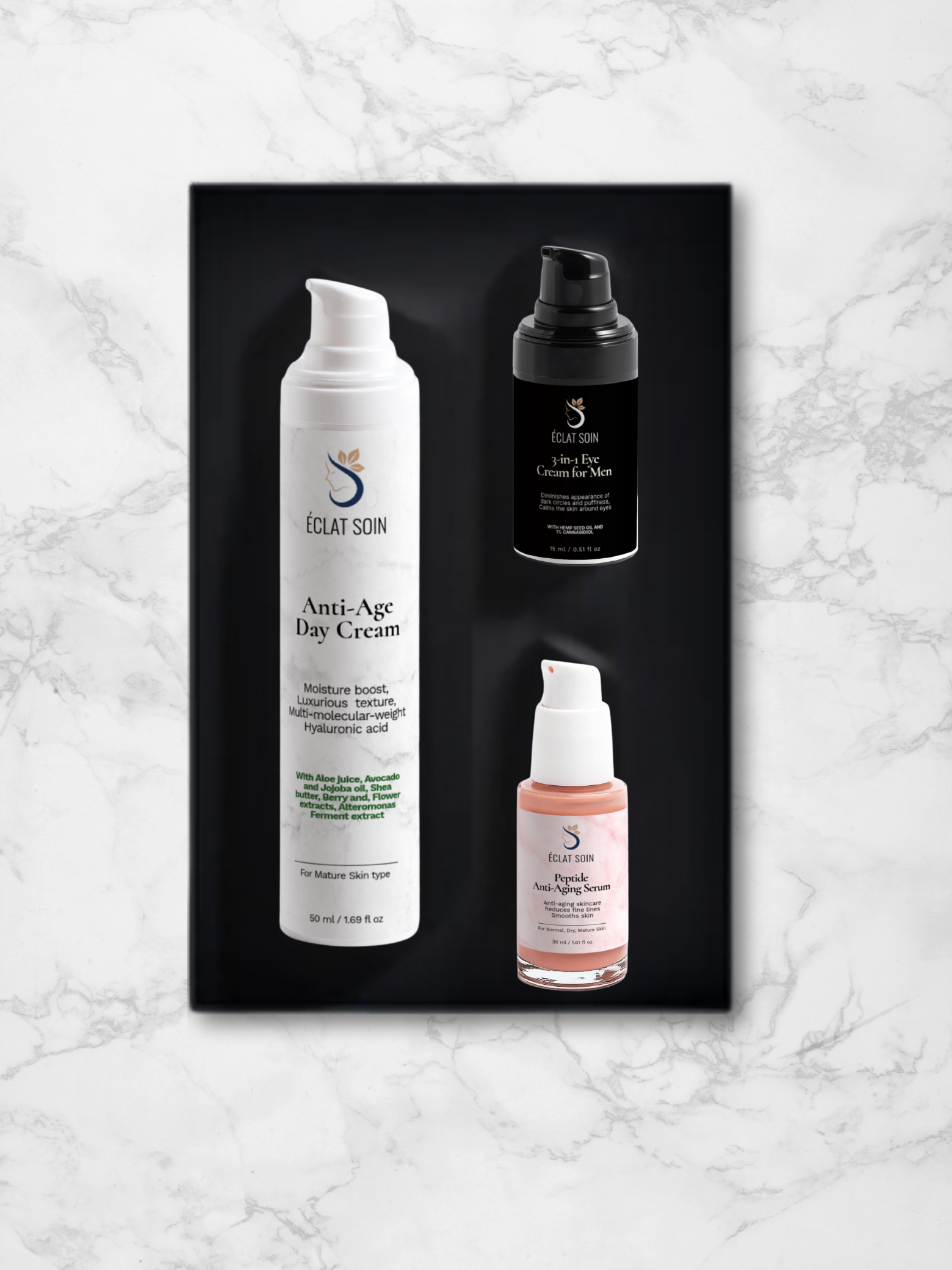 The Age-Defying Trio Skincare Collection Box featuring anti-age day cream and serums